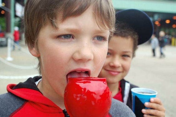 Caleb Capps Enjoys a Candied Apple