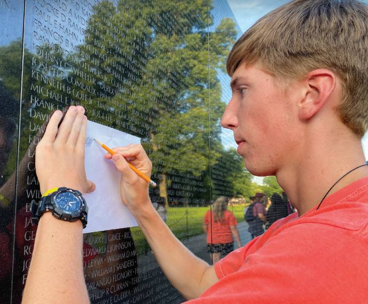Youth Tour participant pictured at the Vietnam War Memorial