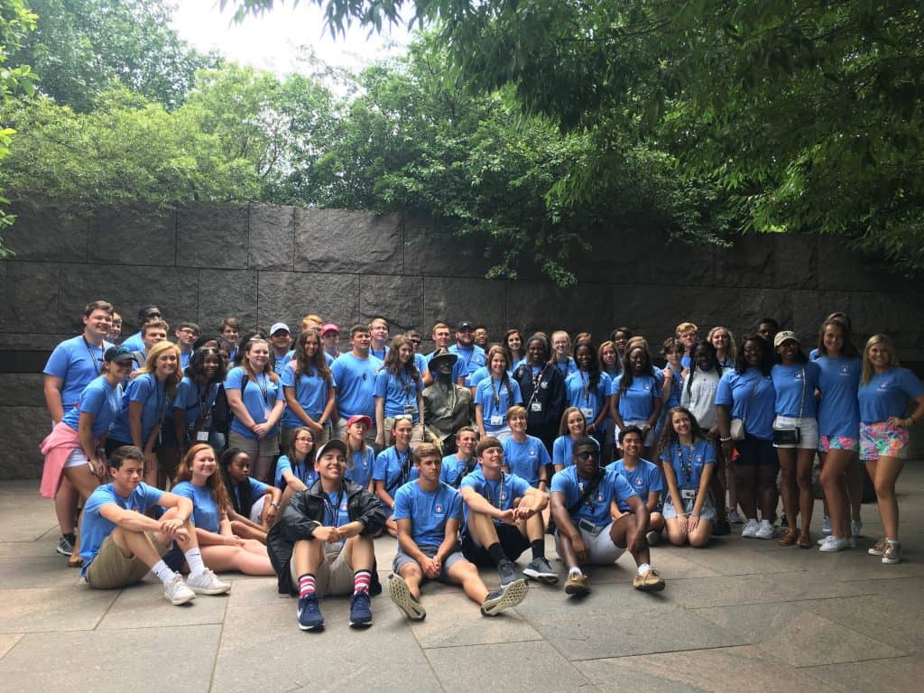 Group photo of Youth Tour participants at the Franklin Delano Roosevelt Memorial on the National Mall in Washington, D.C.