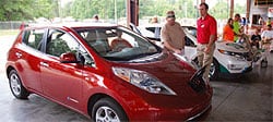 Jay Leake checks out the all-electric Nissan Leaf with Central Electric Power Cooperative's Scott Hammond during YEC's Annual Meeting.