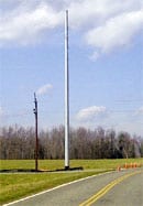 Old poles are being replaced with steel towers which are double in height to strengthen a 4.7-mile section of line.